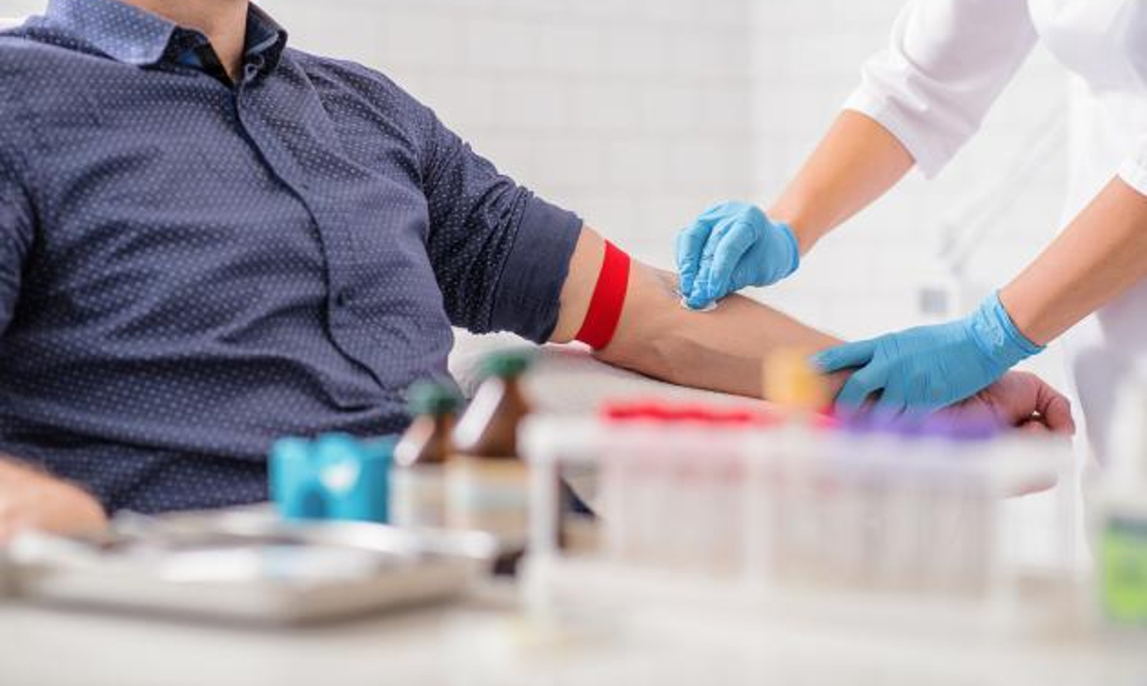 A person gets a blood test for diabetes