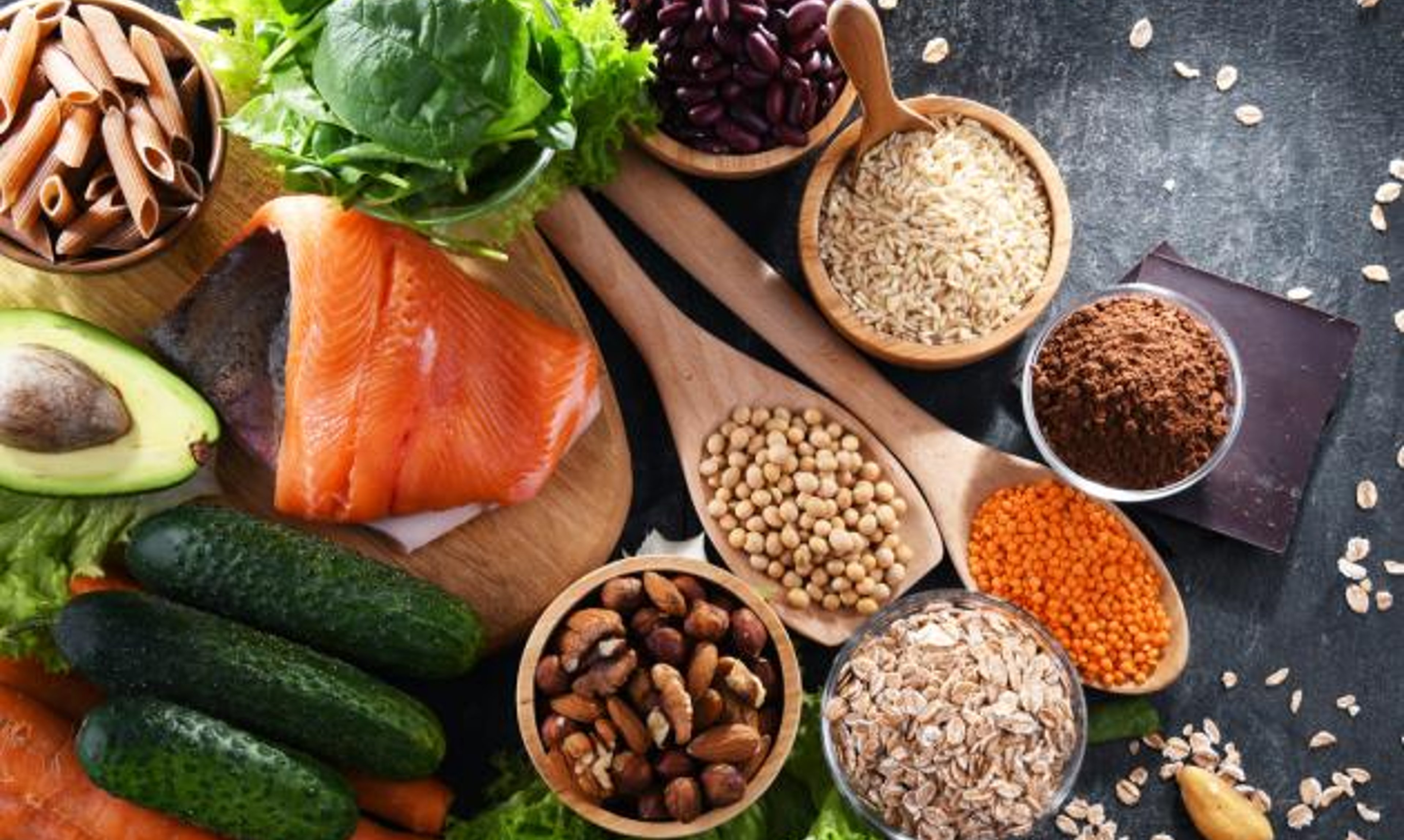 Overhead shot of salmon, carrots, cucumber, etc.