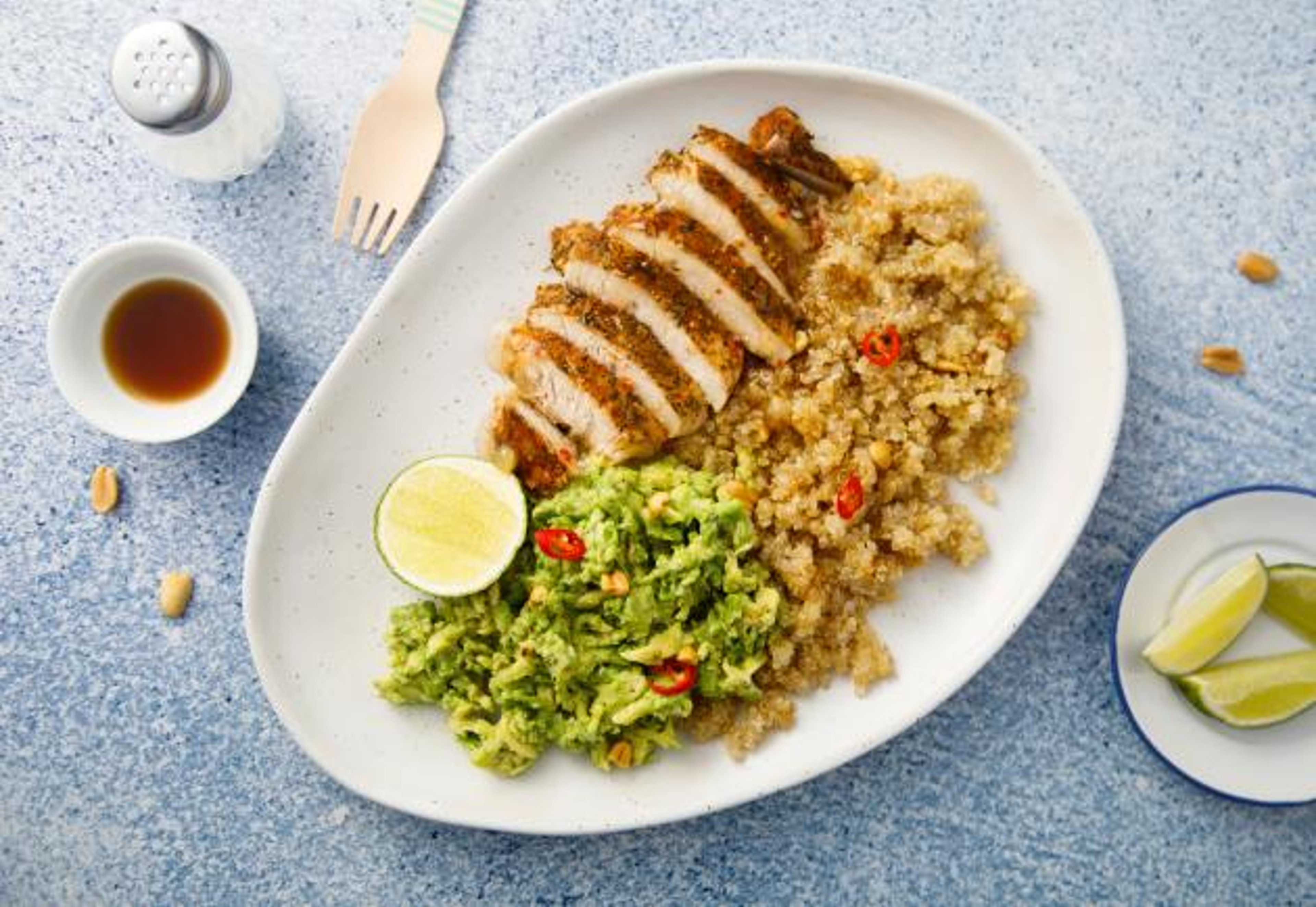 Grilled chicken with quinoa and mashed avocado