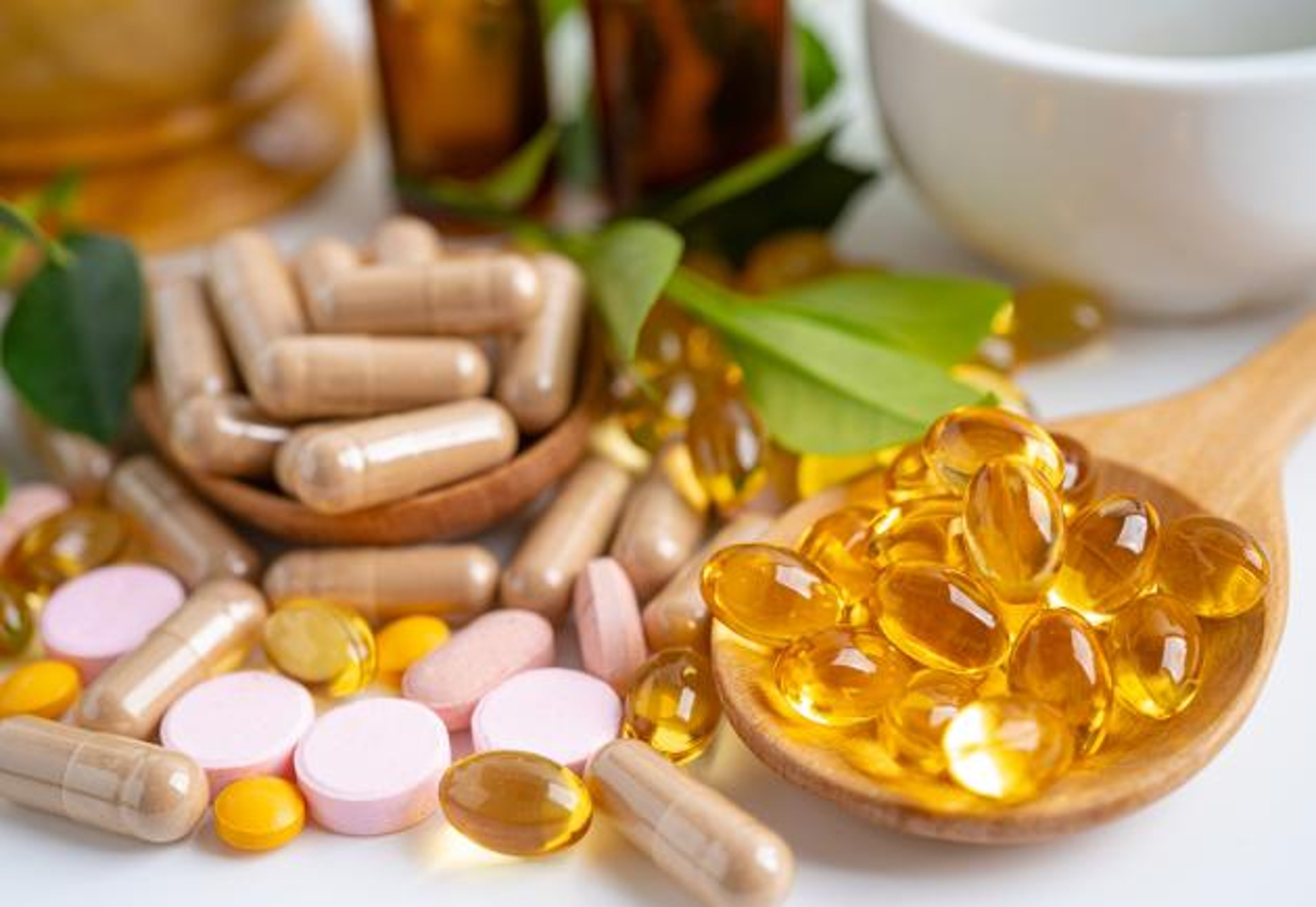 image of different colored vitamins and supplements