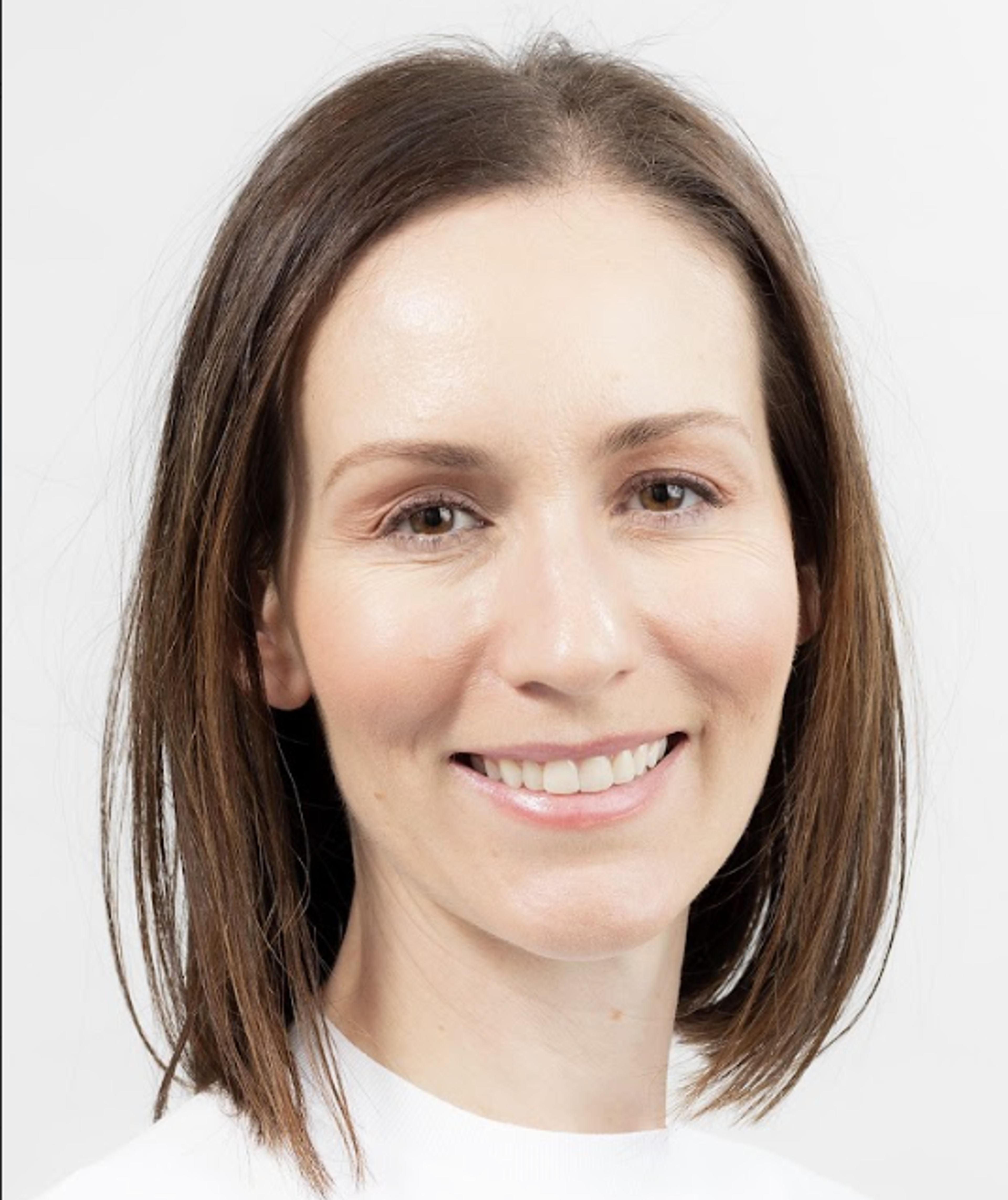 Dr. Arianne Sweeting, woman with shoulder-length brown hair