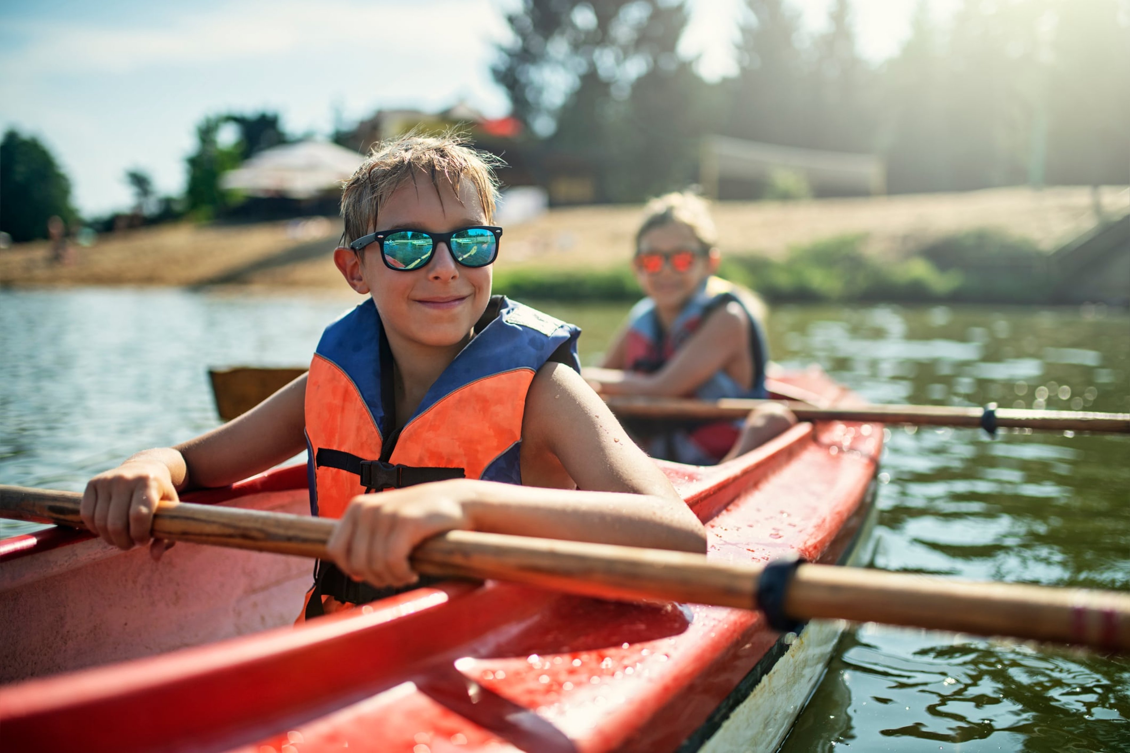 Kids canoeing at summer camp