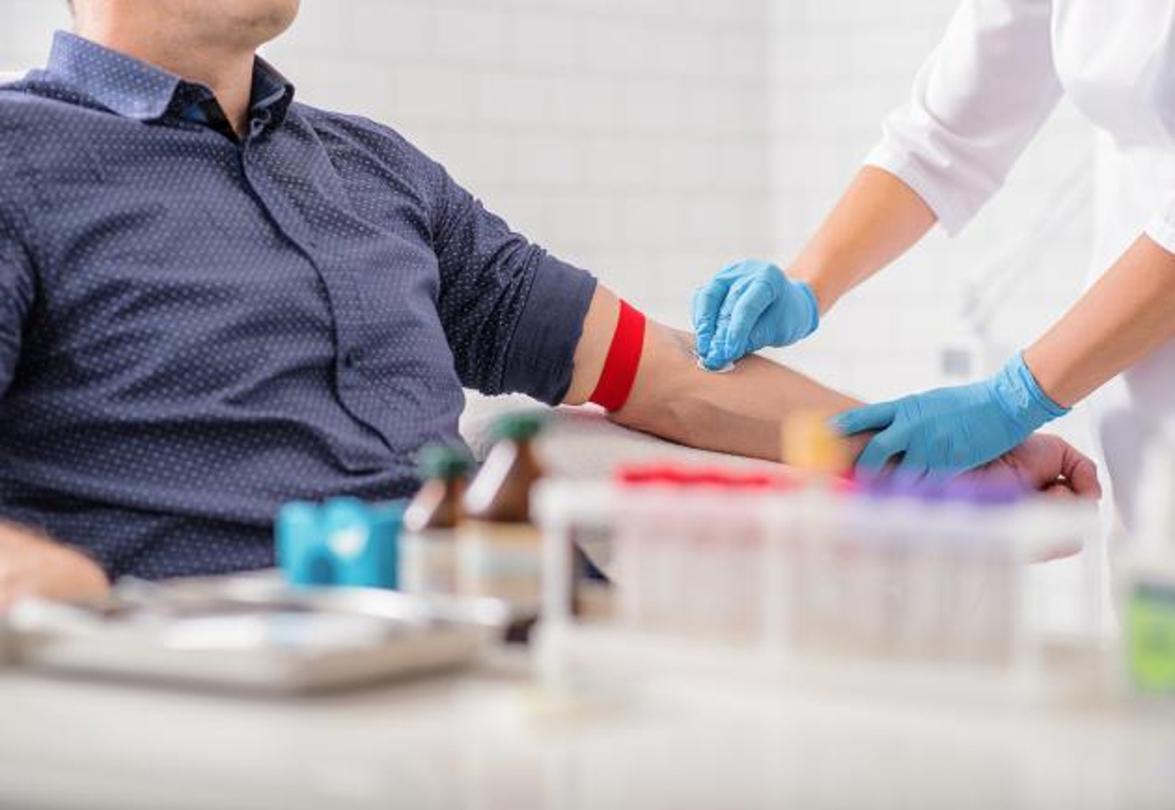 A person gets a blood test for diabetes