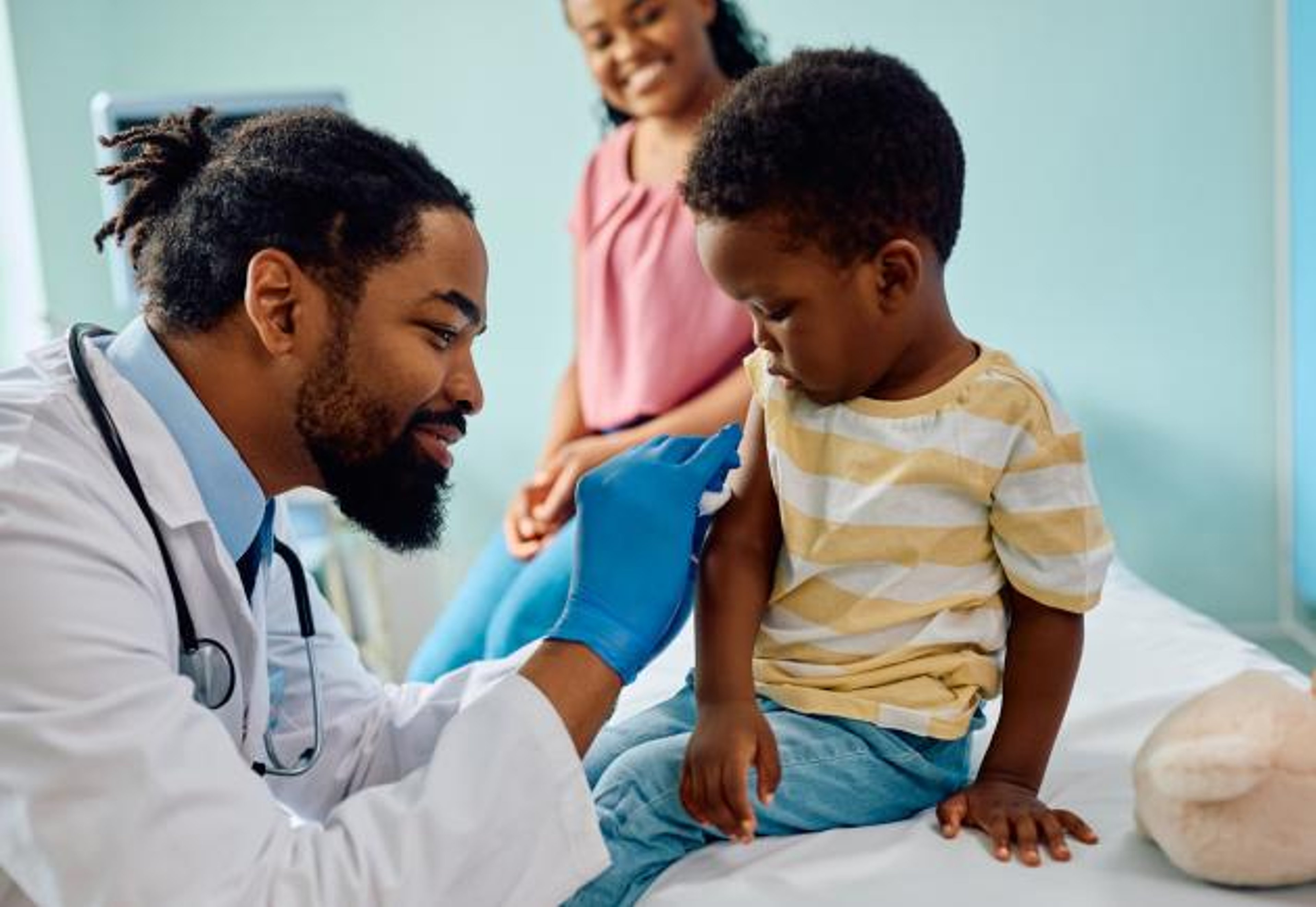 Doctor with child at office