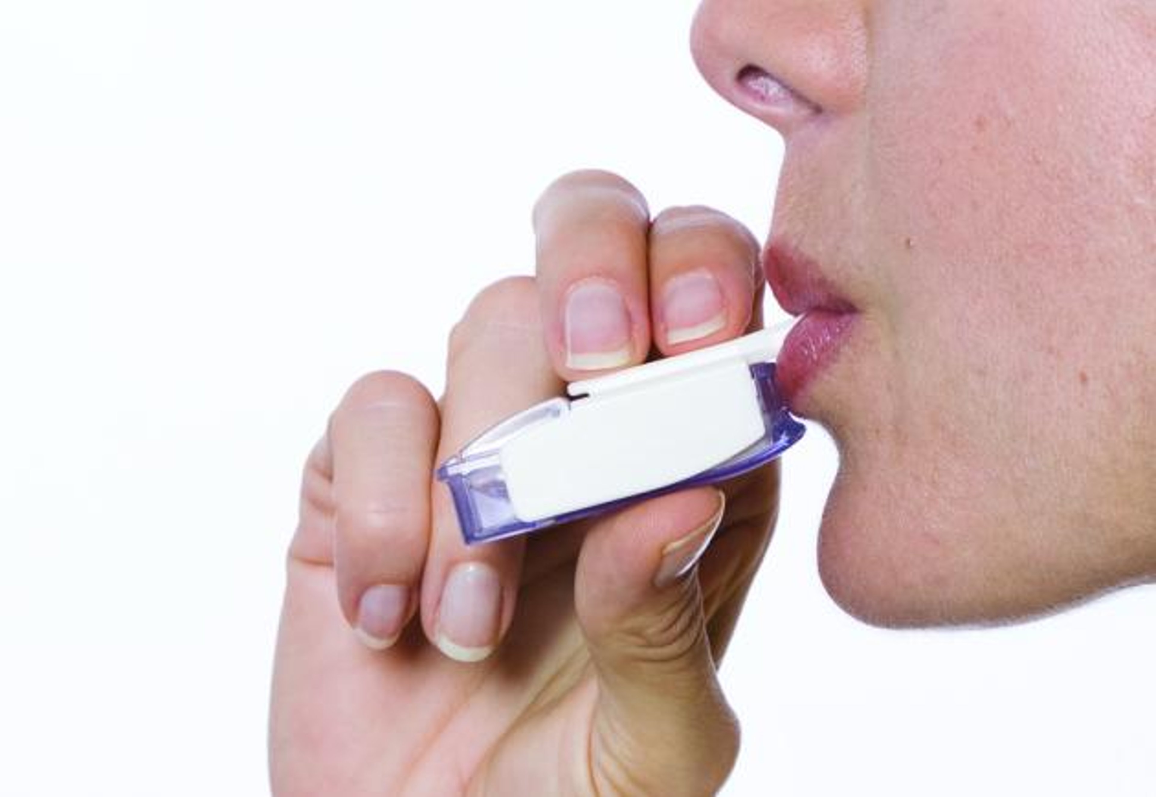 Woman using Afrezza insulin inhaler