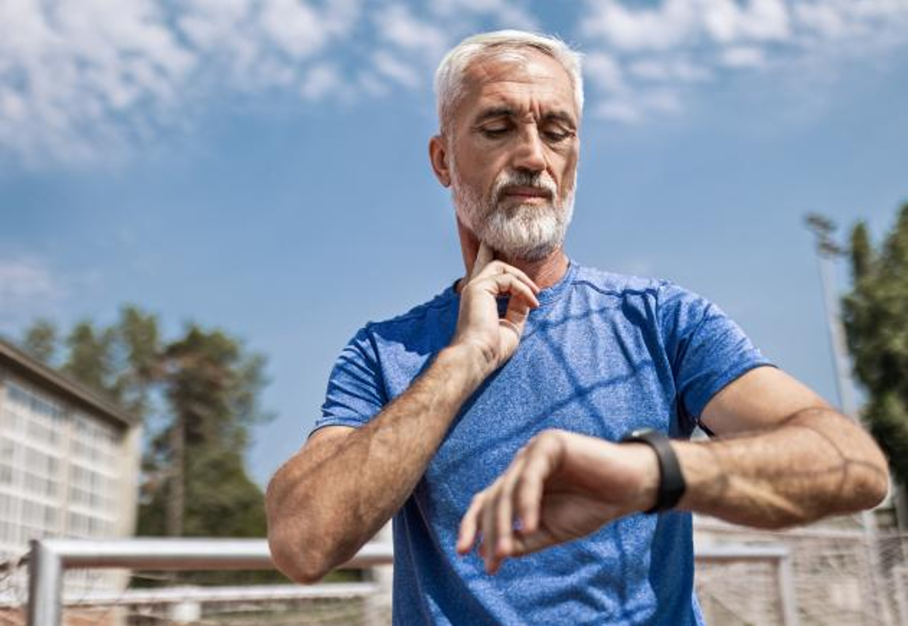 Man stops from a job to check his pulse