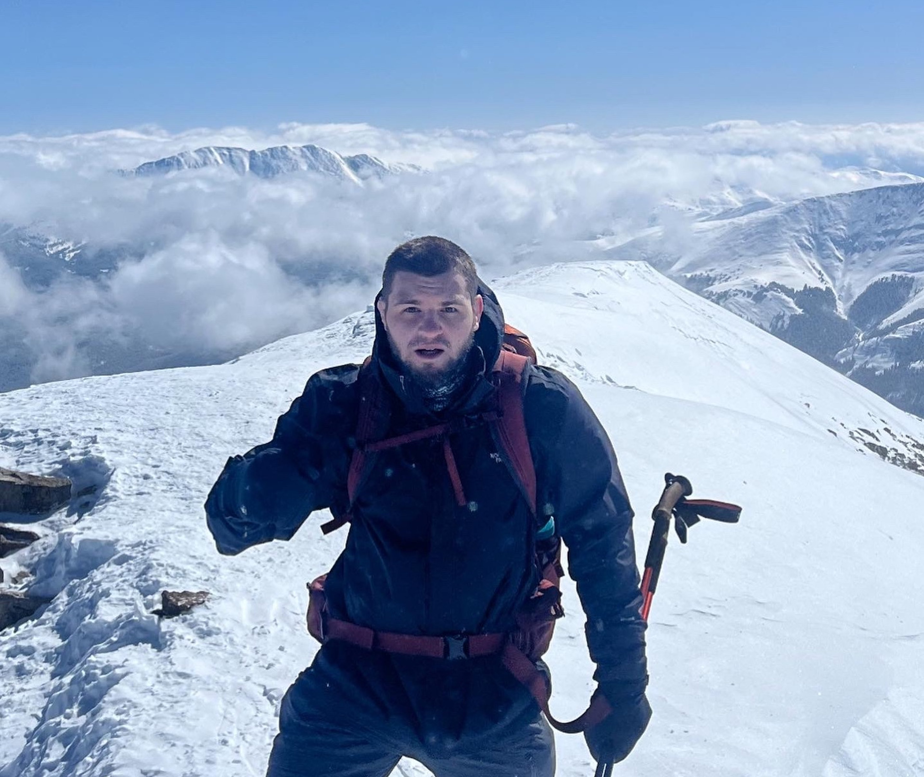 Jon Kunneman climbing a mountain