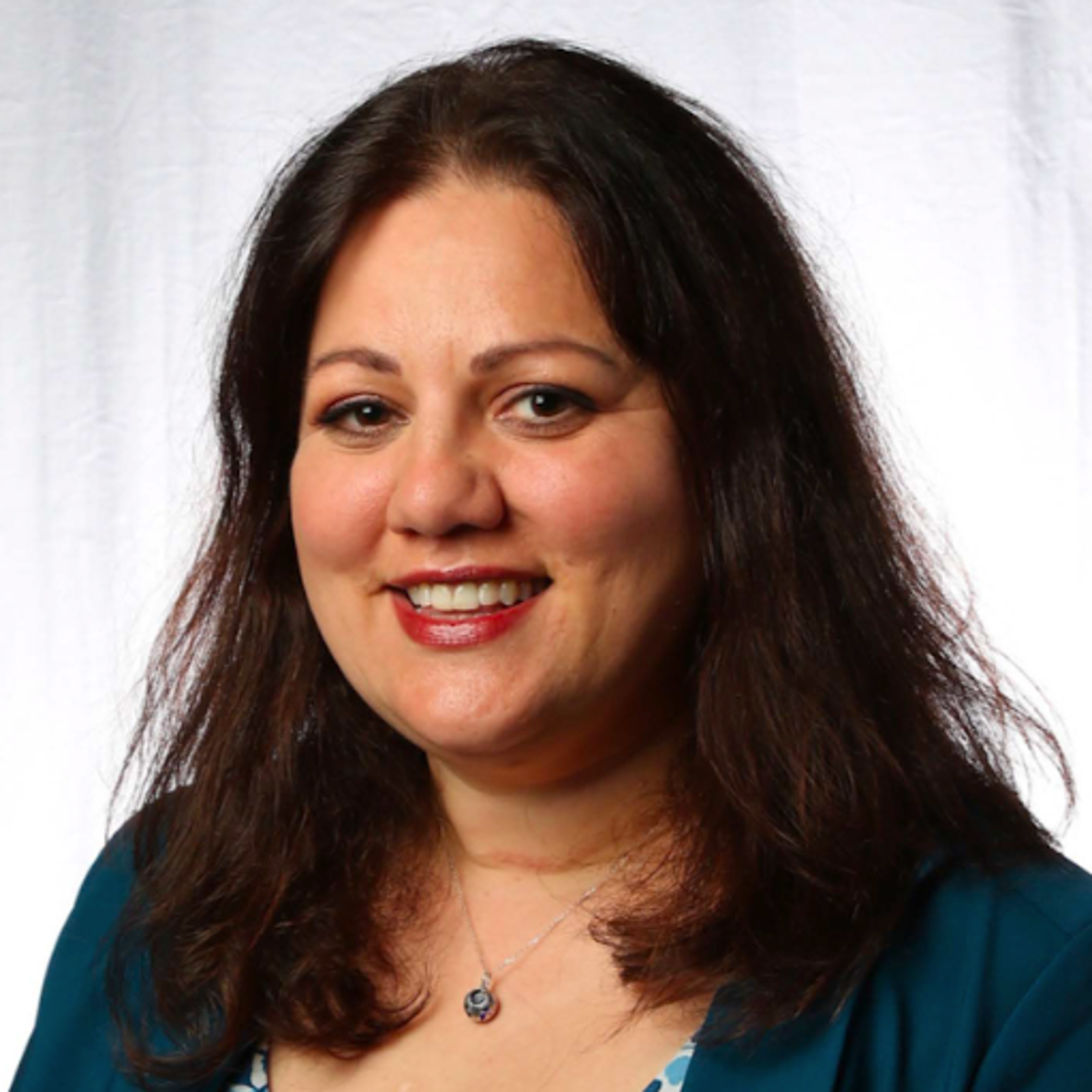 Photo of Professor Jennifer Sherr, a woman with long brown hair