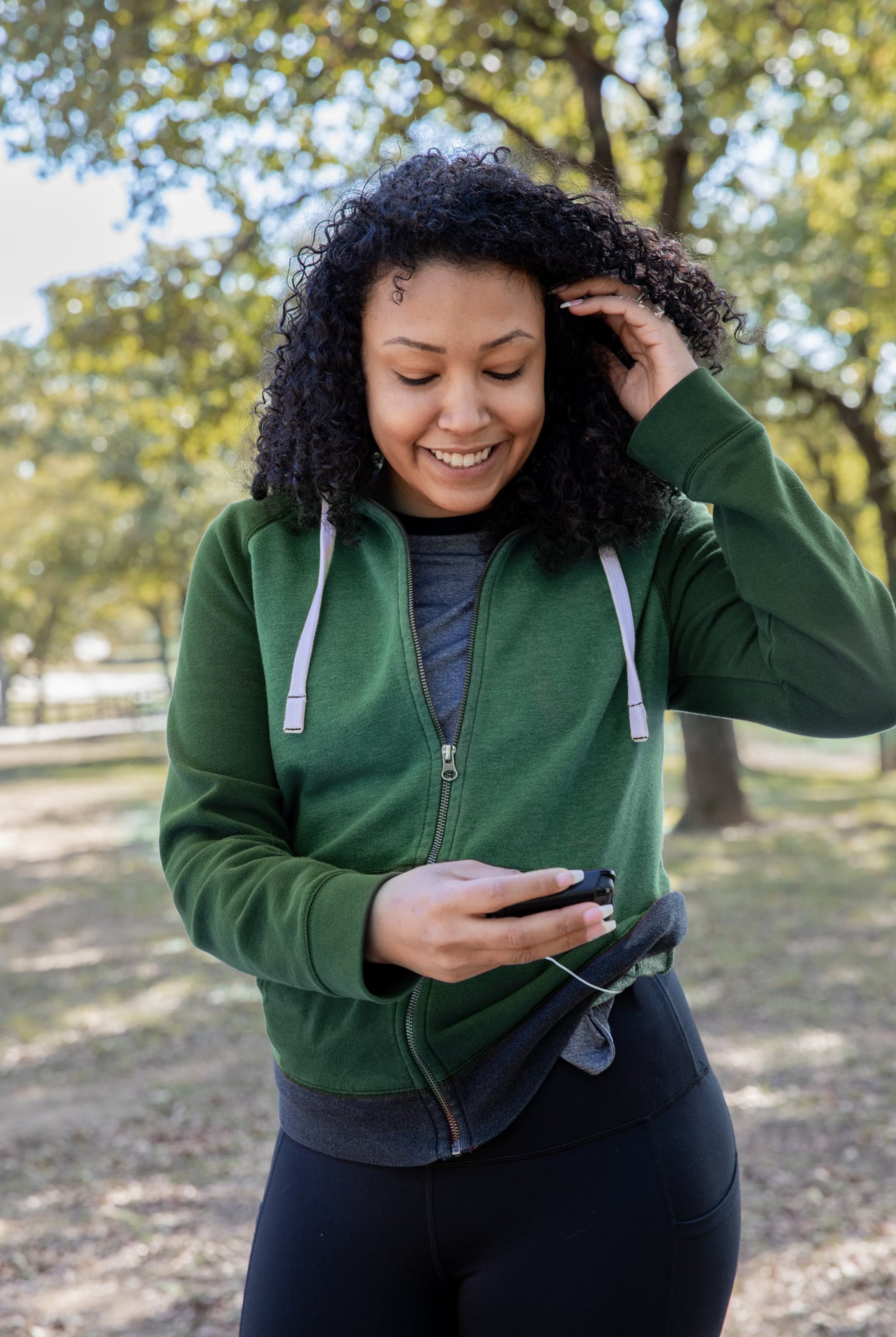 Eritrea Mussa checks her blood glucose while out on a run