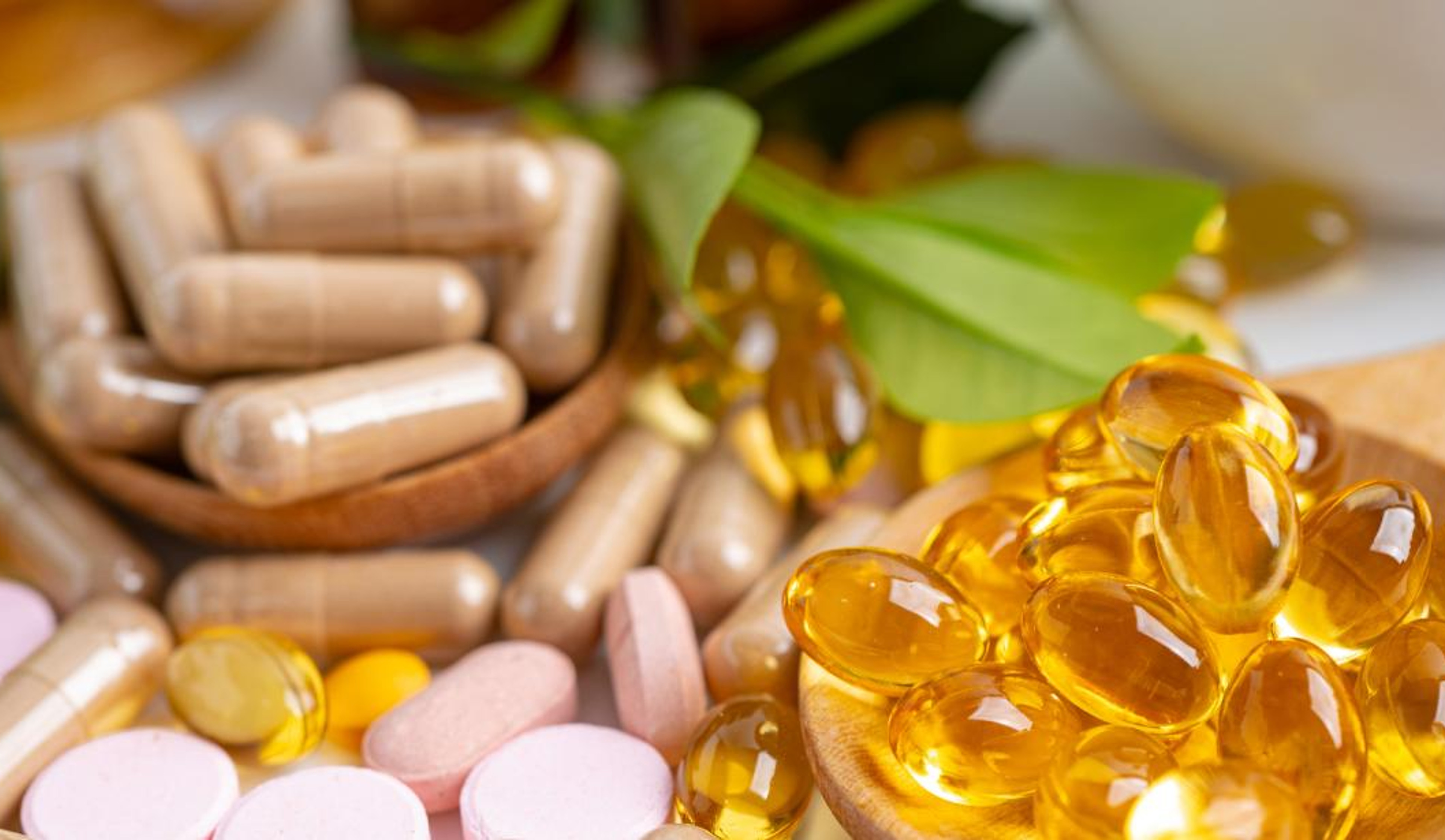 image of different colored vitamins and supplements